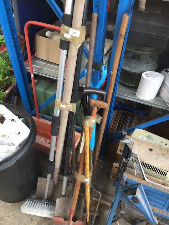 Two bundles of garden tools