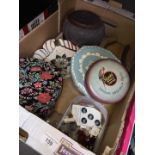 A box of misc vintage tins, African carved bowl, soapstone dish, buttons, crumb tray and brush.
