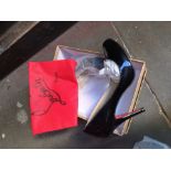 A pair of repro Christian Louboutin ladies shoes, size 7.