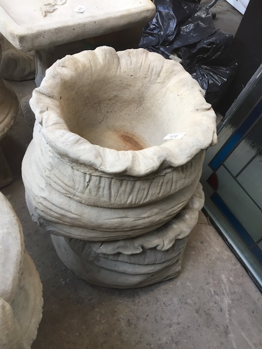 A pair of large sack planters