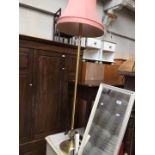 A brass effect standard lamp