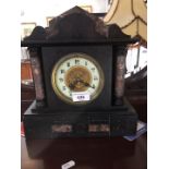 A French Medaile de Bronze by S. Marti black marble mantel clock - recently serviced - with pendulum