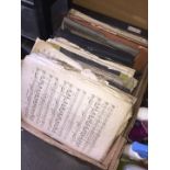 A box of sheet music.