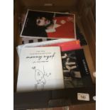 A box containing John Lennon book etc