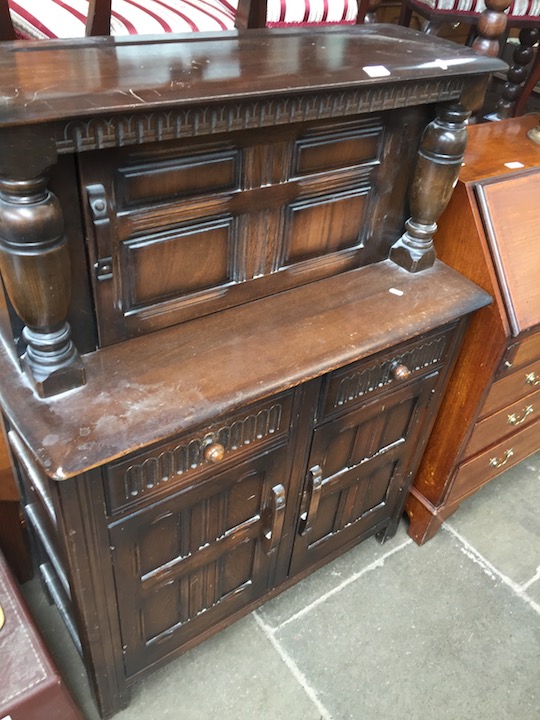 A small oak court cupboard