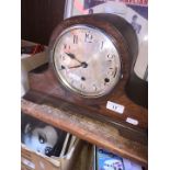 A domed mantle clock.