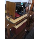A cased electric Singer Class 99K sewing machine, with lead & foot pedal