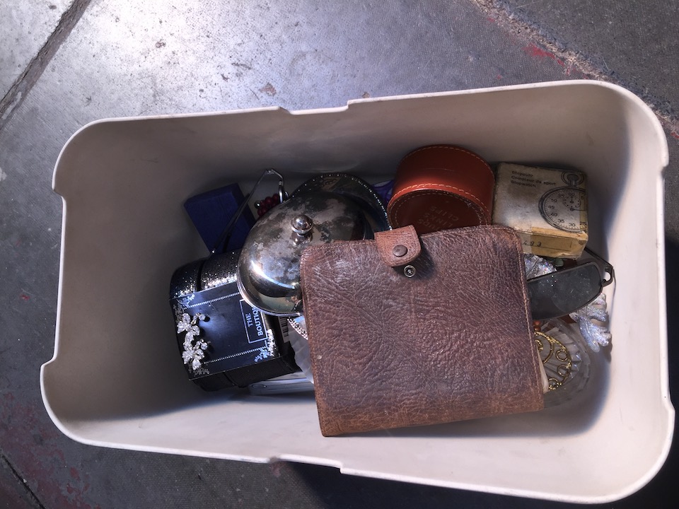 A box of misc to include magnifying glass, sunglasses, EPNS, phone, etc.