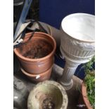 2 terracotta planters and a jardiniere