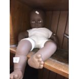 A child's black doll