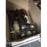 A box of brassware and wood planes