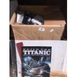 A box with quantity of "Build the Titanic" kits.