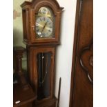 A modern Westminster chime oak framed long case clock