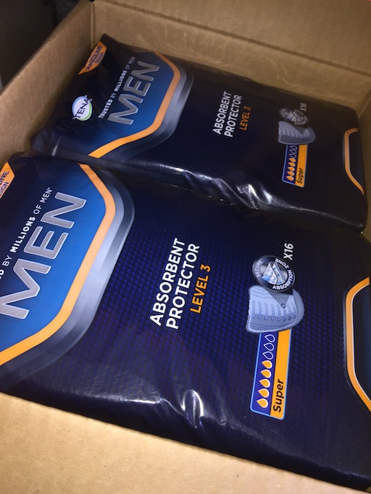 A box of men's Tena pads.