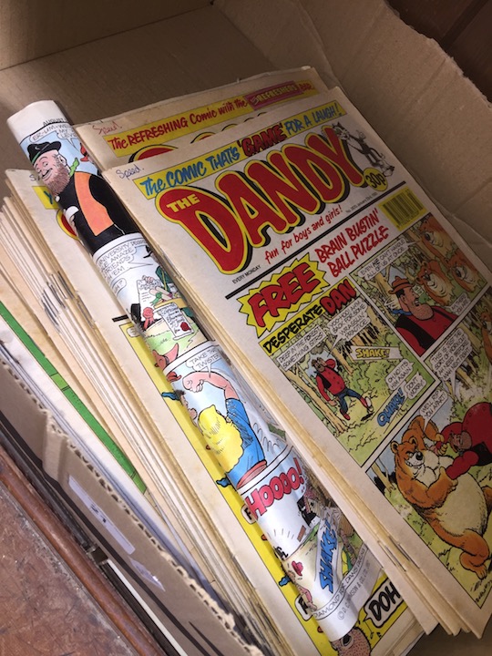 A box of vintage comics, mainly Dandy and Beano.