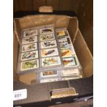 A quantity of cigarette/trade cards - all complete sets