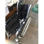 A wheelchair with footrests.