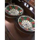 A pair of leaded glass ceiling light shades