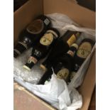 5 Guinness bottles - sealed.