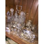 Selection of EPNS inc. cruet stand with glass bottles