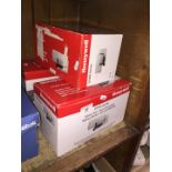 3 boxed Honeywell DT900 Series dual tec motion sensor with anti masking.