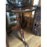 A mahogany wine table, height 44cm.