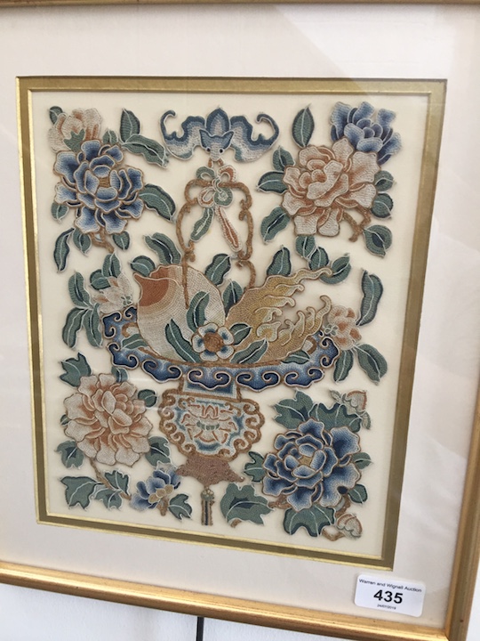 A 20th century Chinese embroidery with a bat and lotus flowers, 18cm x 23cm, glazed and framed.