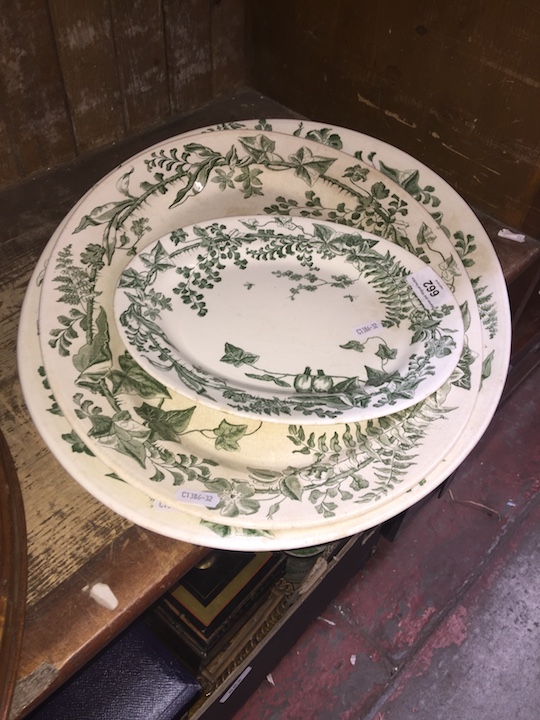 A group of three graduated Fern Wreath pattern pottery platters.