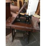 A treadle sewing machine.