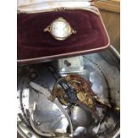 A tin of watches, silver, jewellery etc.