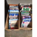 2 boxes of football programmes