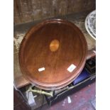 An Edwardian oval tray with central inlay and brass handles.