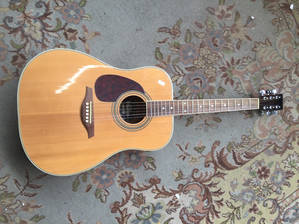 Left hand "Vintage" acoustic guitar, bound rosewood neck, grover type tuners, rosewood back and