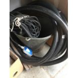 A Polier Plus POW660 submersible pump and hose