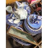 A crate of blue and white pottery including Delft