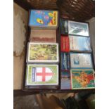 A case of vintage playing cards, ,mainly shipping and railway themes.