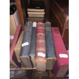 A collection of old leather bound books to include poetry.