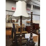 A stained beech standard lamp.