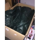 A box containing 2 pieces of Tarpaulin