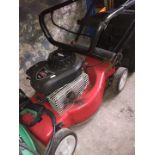 A Sovereign petrol lawn mower