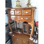 A reproduction Georgian style hall table on cabriole legs