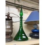Green glass vase with stopper