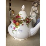 A Royal Albert Old Country Roses teapot.