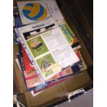 A box of football programmes including Finals.