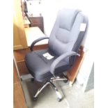 A black swivel office chair