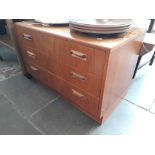 A low teak G-Plan chest of 3 drawers