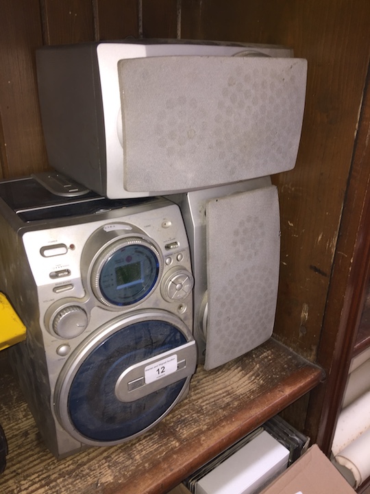 An Alba CD / cassette / radio and pair of speakers.