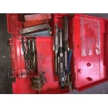 A Hilti case with contents to include engineering tools, taps, drill lathe and grinder cutters, etc.