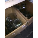 Two boxes of glass jars