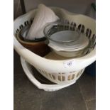 2 laundry baskets of kitchen bowls.